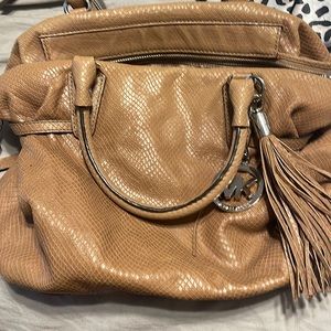 Michael kors tan leather bag with silver accents like new